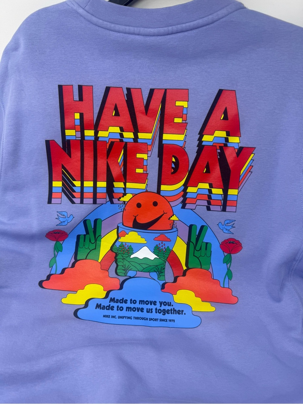 Nike women’s Lavender Crewneck Sweatshirt with Colorful Surf Graphic